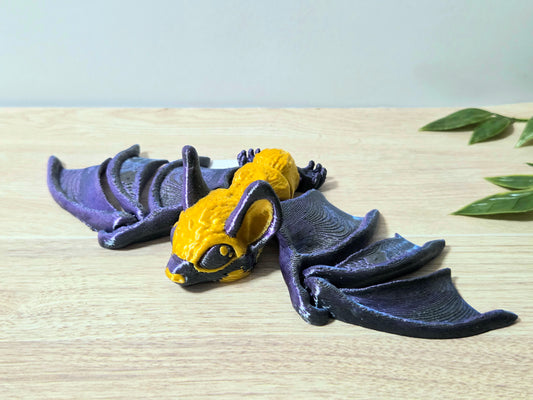 Dark gold bat
