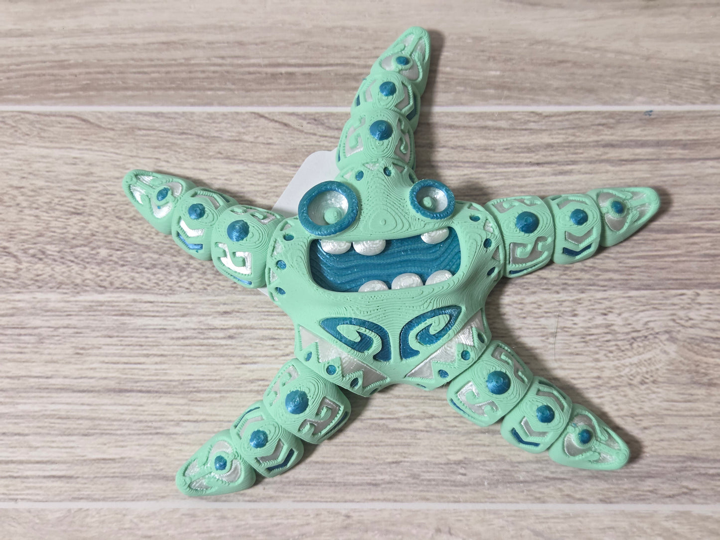 Green tribal starfish