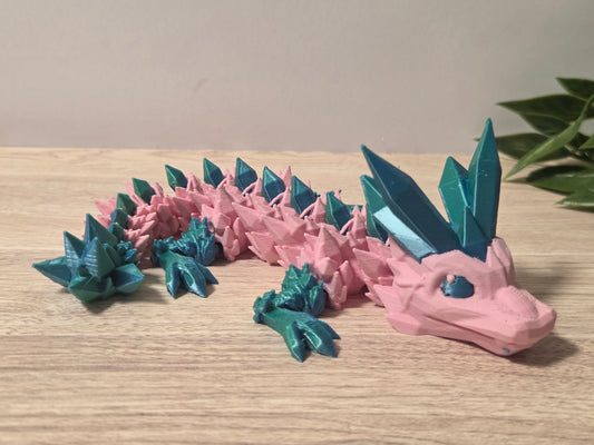 Pink and teal baby crystal dragon