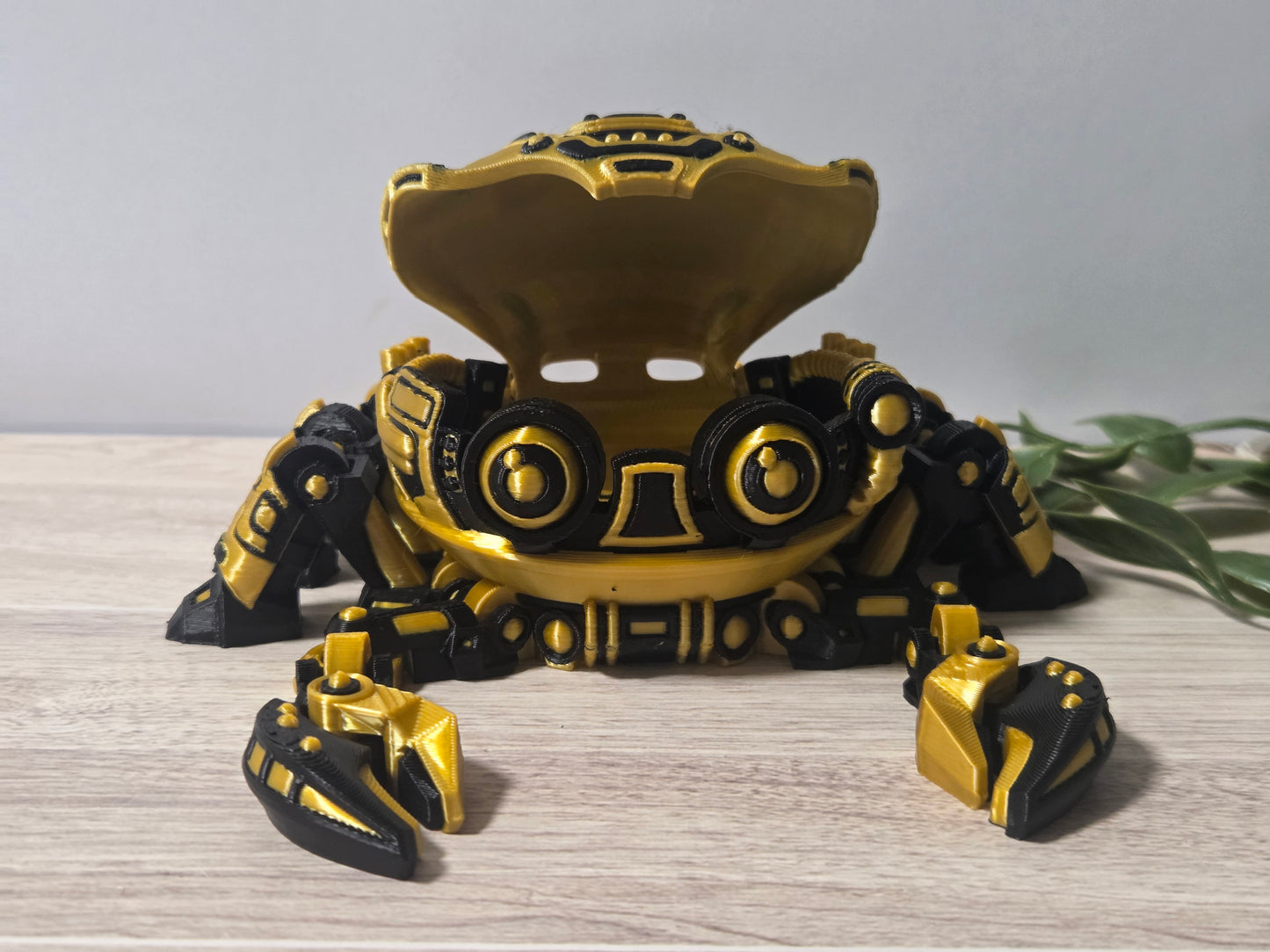 Gold black robot crab