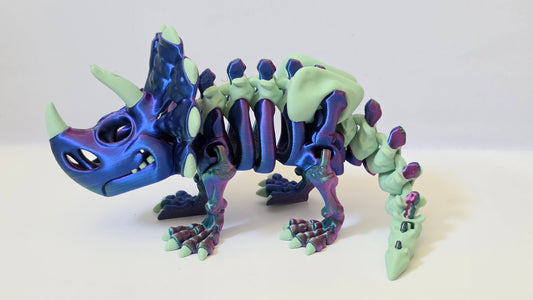 Puple green triceratops skelly