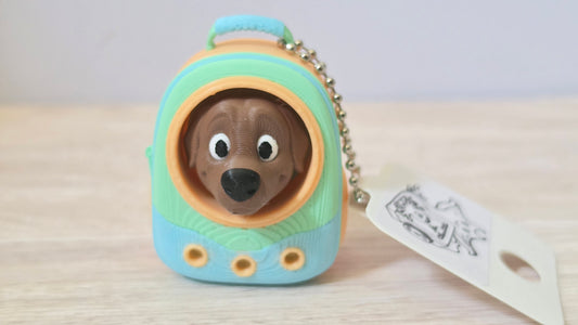 Blue dog backpack clicker