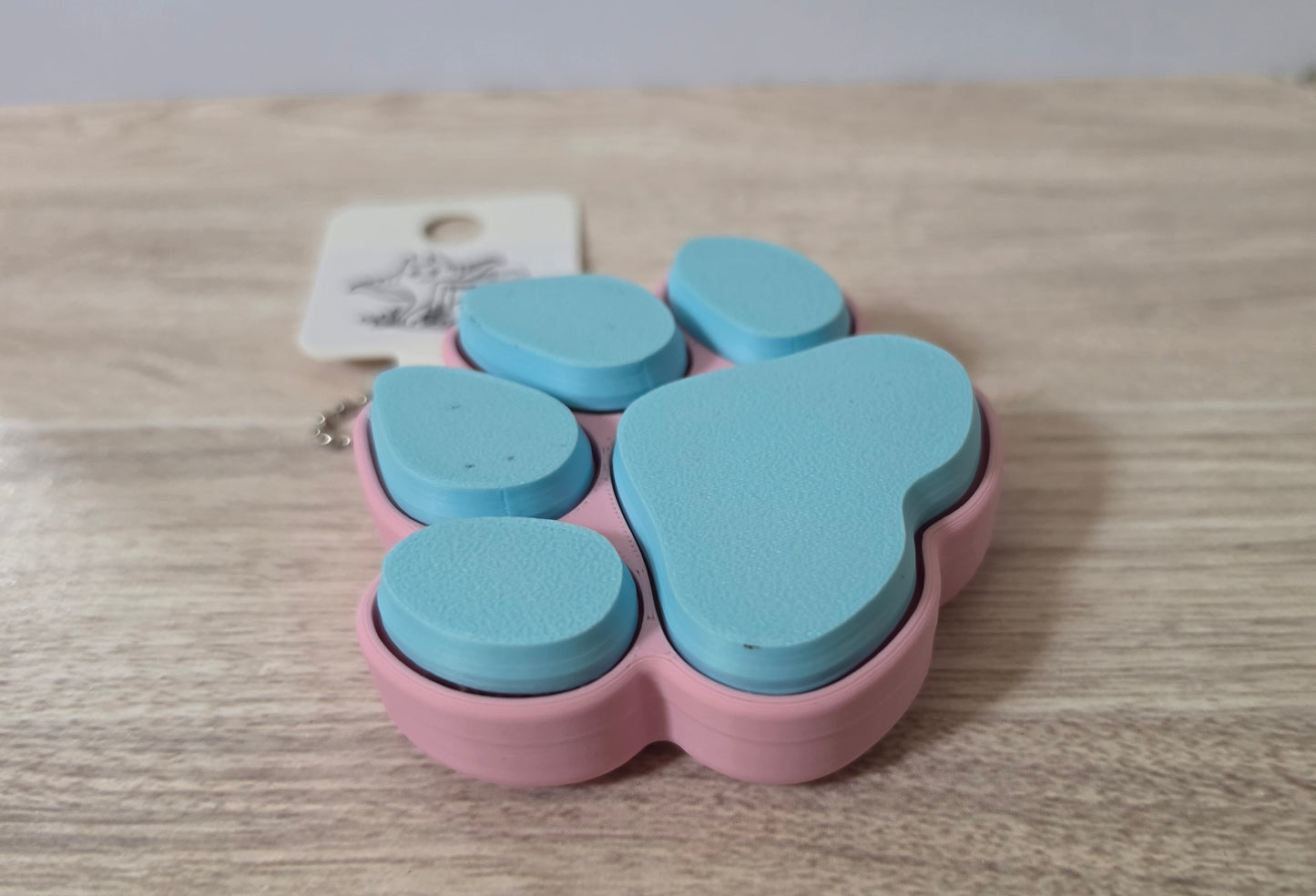 Pink blue paw print clicker