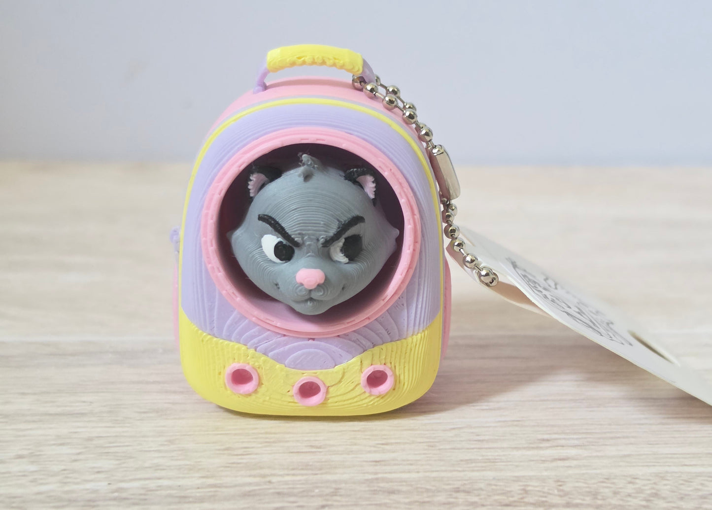 Pink cat backpack clicker