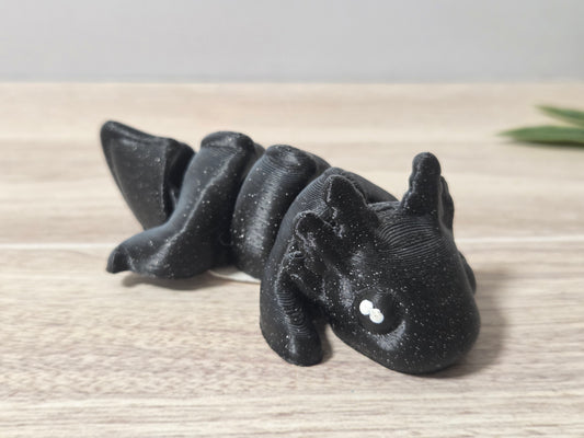 Black baby axolotl