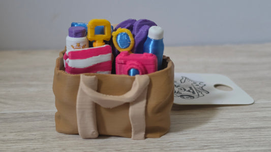 Tan beach bag clicker