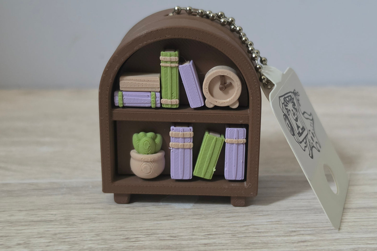 Mini bookshelf clicker