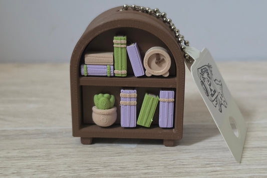 Mini bookshelf clicker