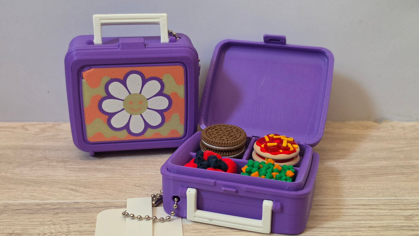 Mystery flower lunch box clicker
